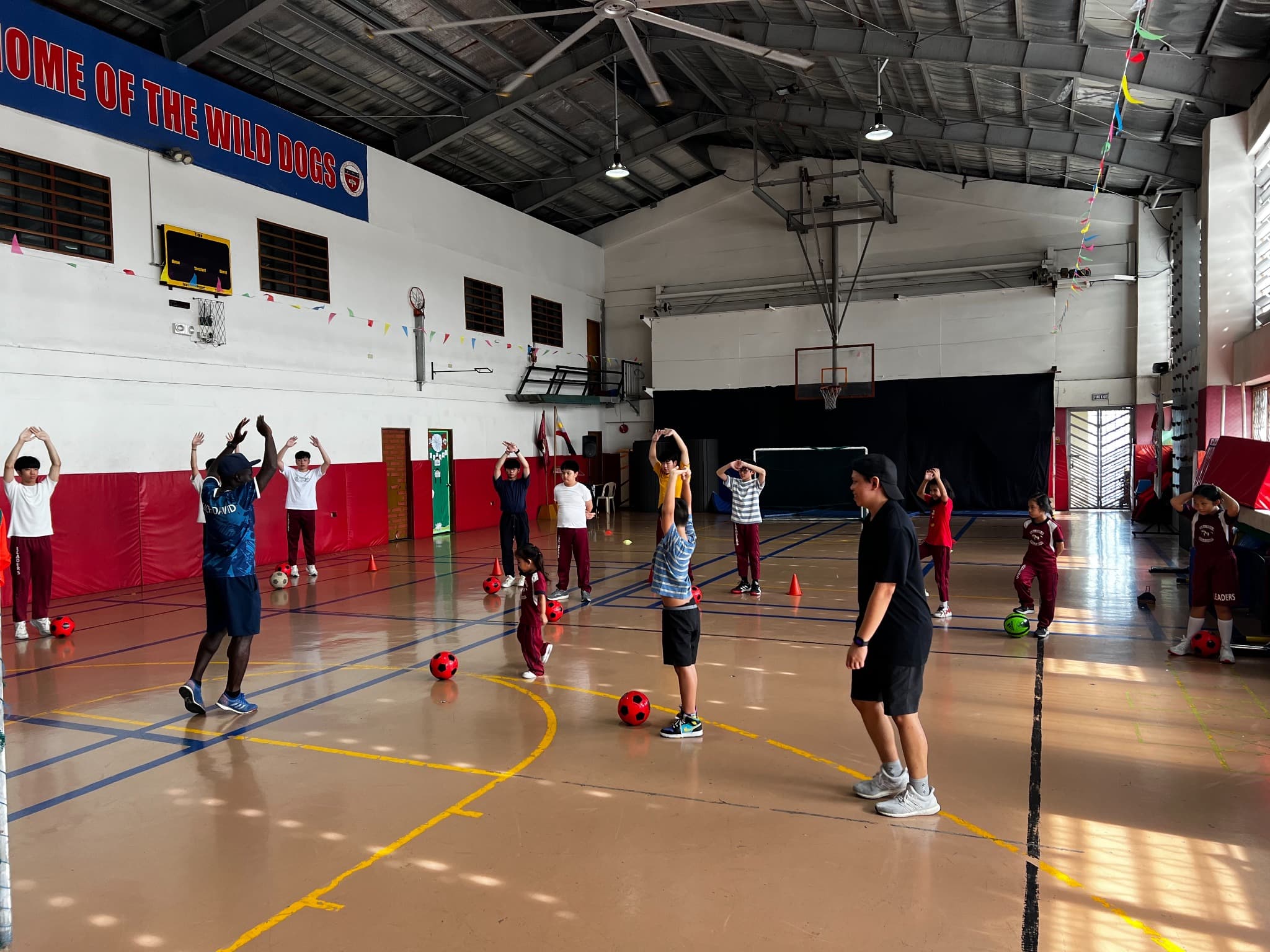 Students at Leaders taking part in a guided futsal training session.
