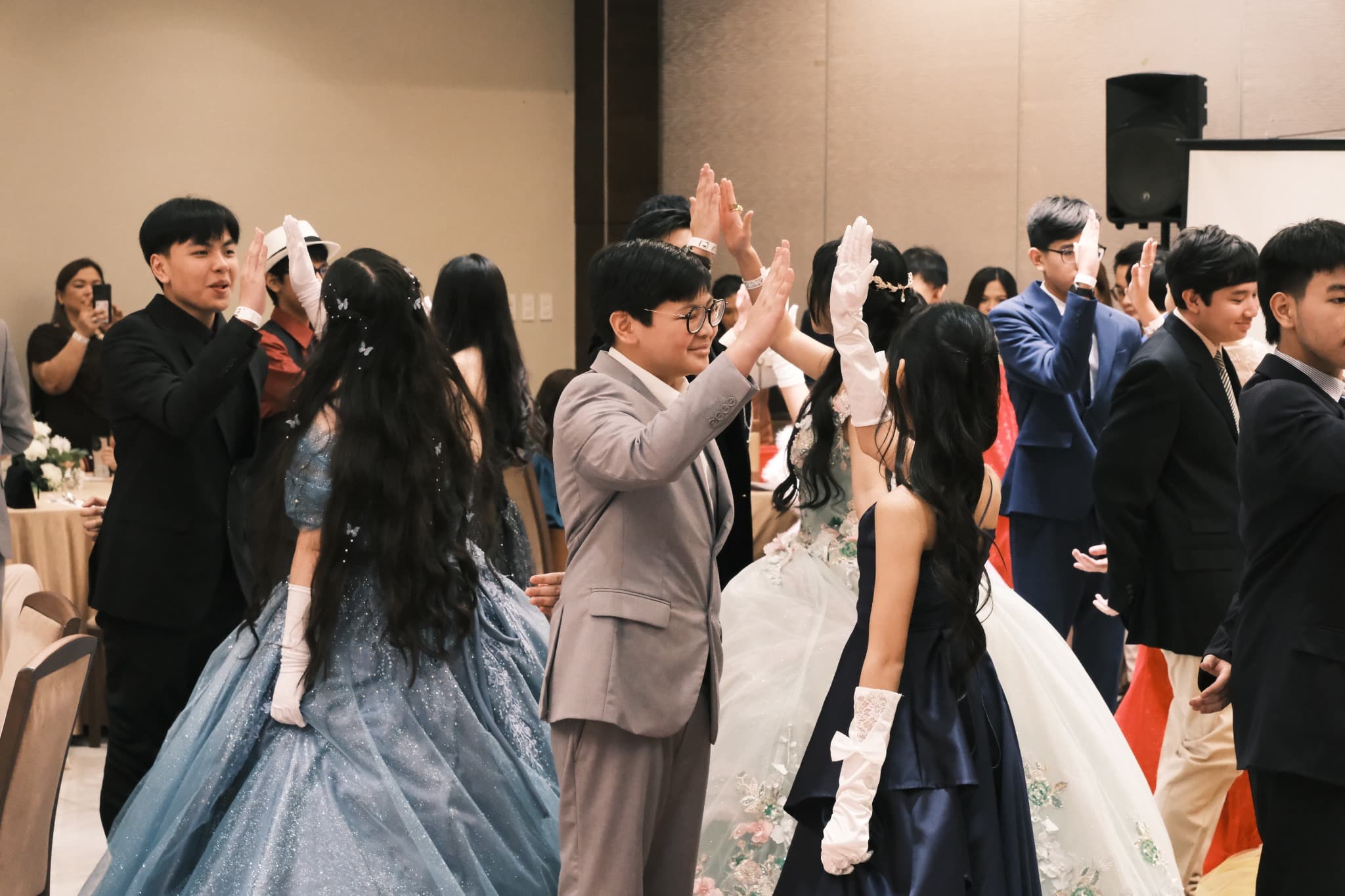 Students at Leaders celebrating together at a formal school event.